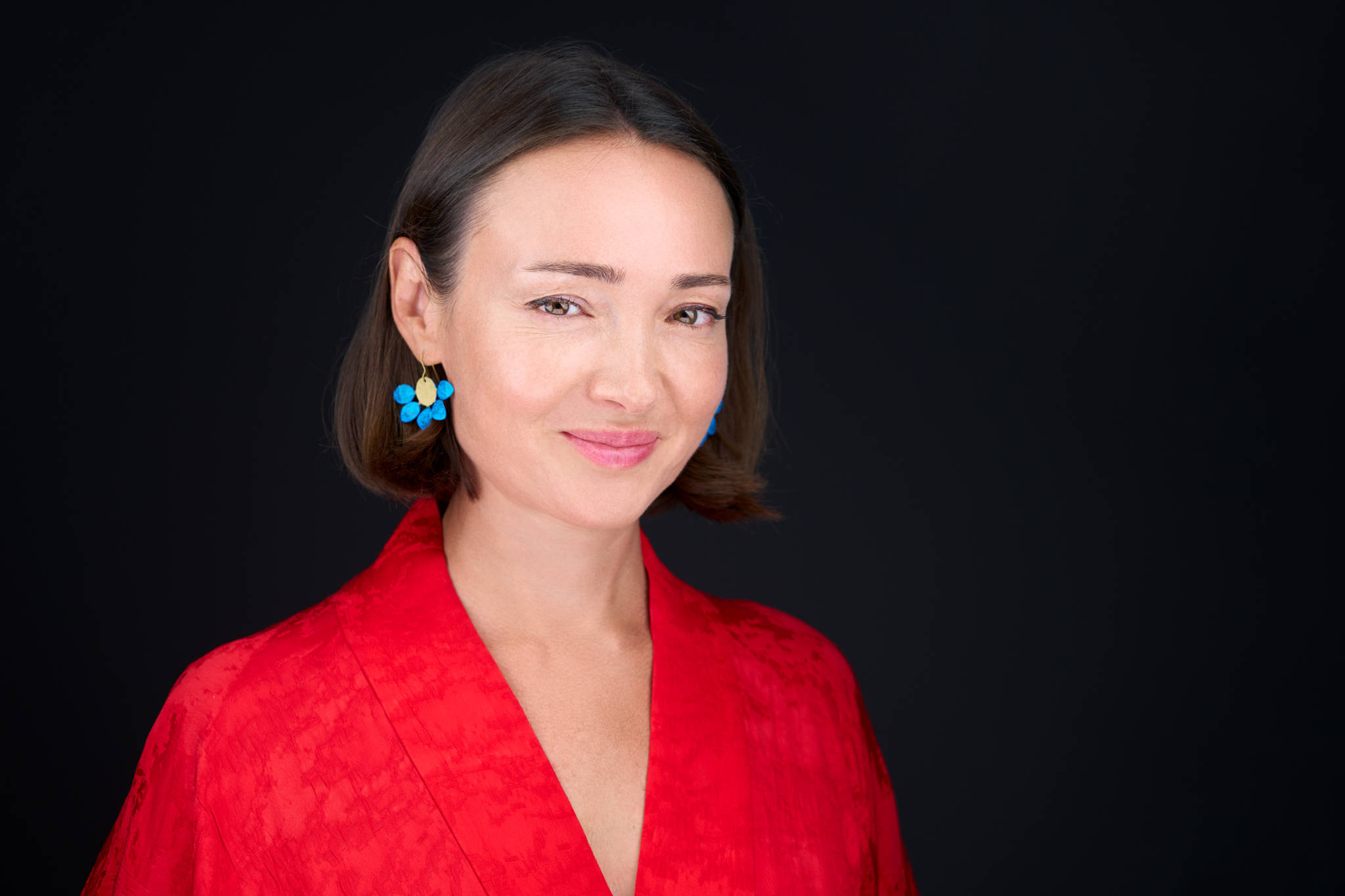 Studio headshot of a woman